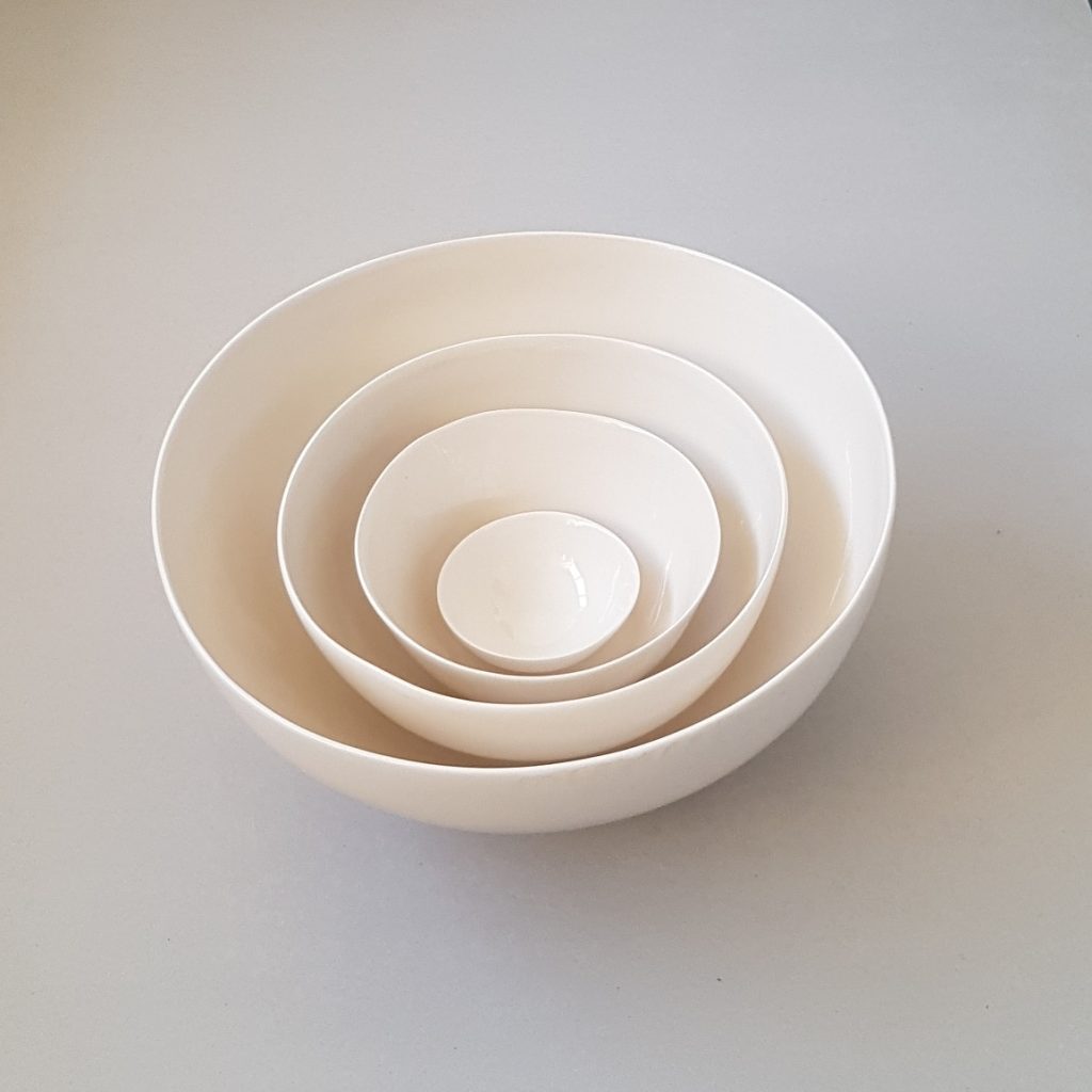 Ceramic bowls nest light